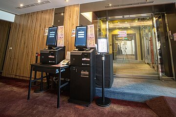 Check-in/check-out kiosk