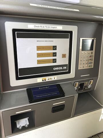 Check-in/check-out kiosk